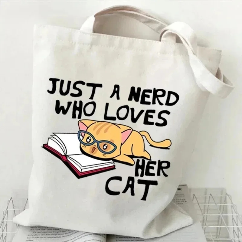 Cat and Book Canvas Handbag La - مراجعة Tote Bag Canvas Print وسعره